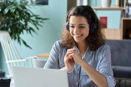 A person on a with headphones on a video call