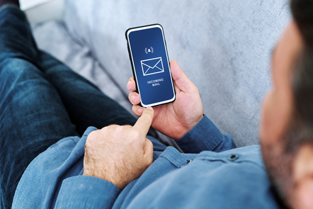 Businessman working at home using with smart phone