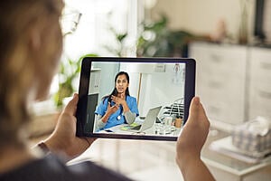 Patient attending remote consultation