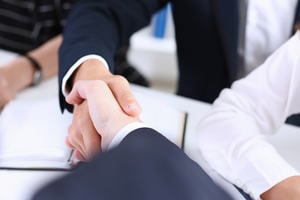 Two people shaking hands