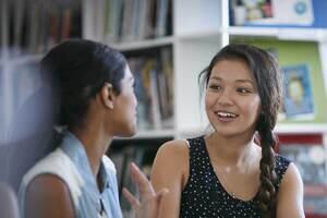 Two people in conversation 