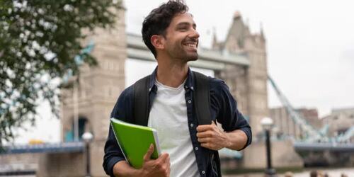 man with a green book